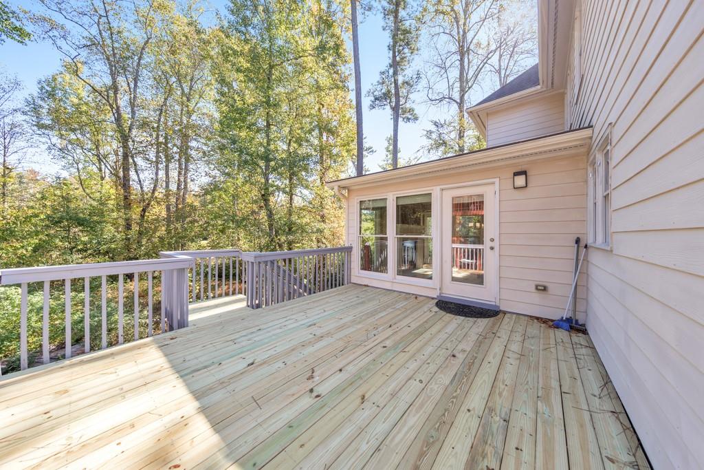 3161 Willowstone Drive Duluth, GA 30096 - Photo 6 of 72 a view of a wooden deck