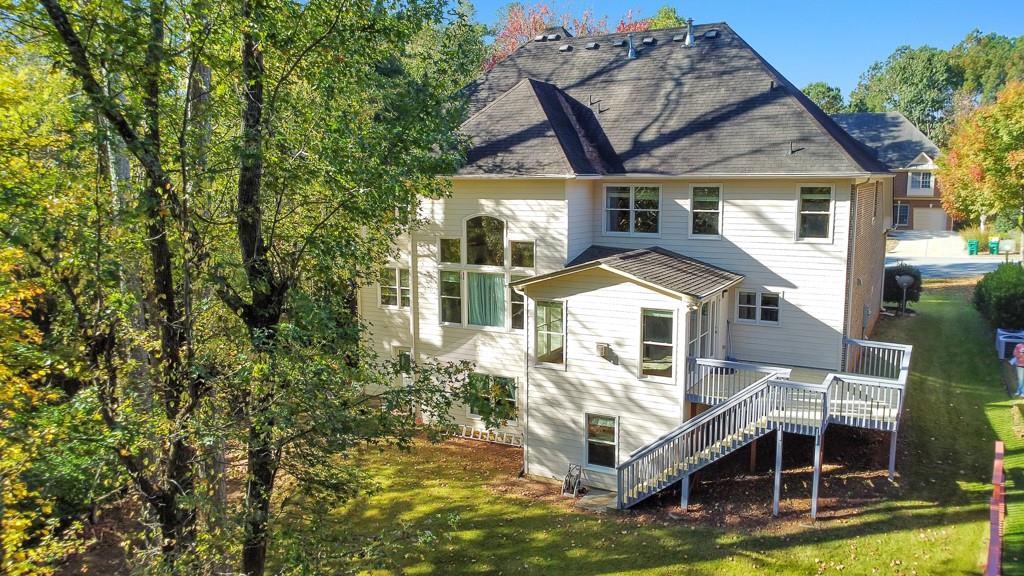 3161 Willowstone Drive Duluth, GA 30096 - Photo 64 of 72 an aerial view of residential houses with yard and swimming pool