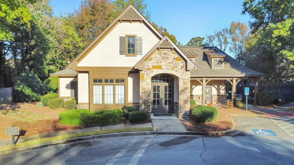3161 Willowstone Drive Duluth, GA 30096 - Photo 68 of 72 a front view of a house with a yard