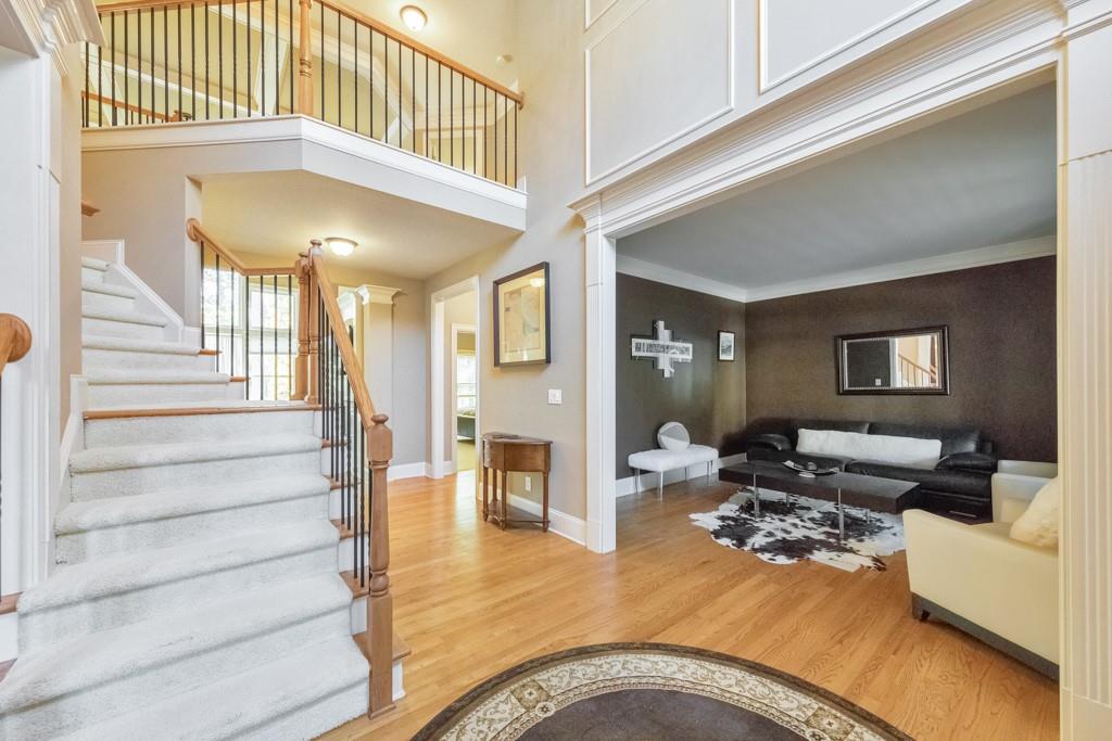3161 Willowstone Drive Duluth, GA 30096 - Photo 9 of 72 a view of a livingroom with furniture and staircase