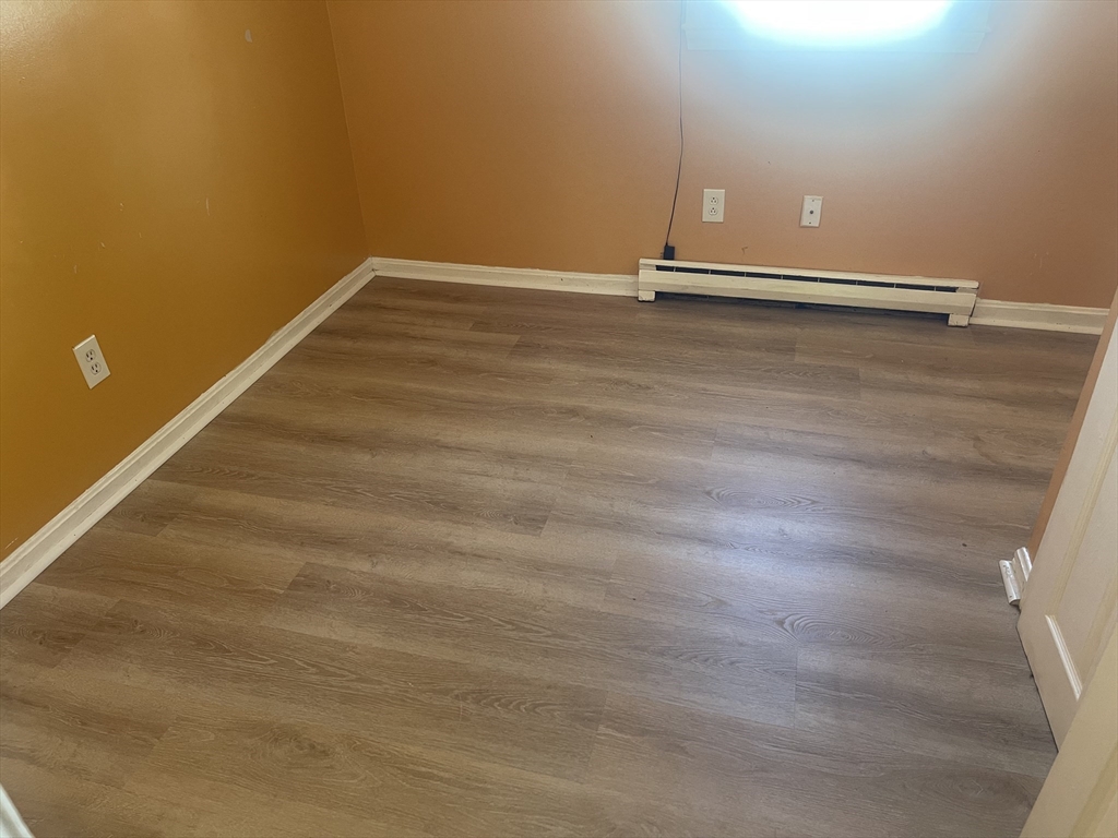 5 Tower Street Methuen, MA 01844 - Photo 3 of 9 a view of a room with wooden floor