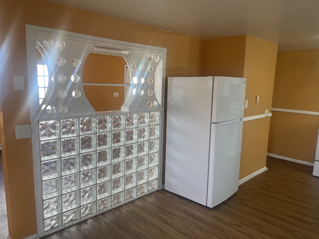 5 Tower Street Methuen, MA 01844 - Photo 9 of 9 a view of a refrigerator in wooden floor