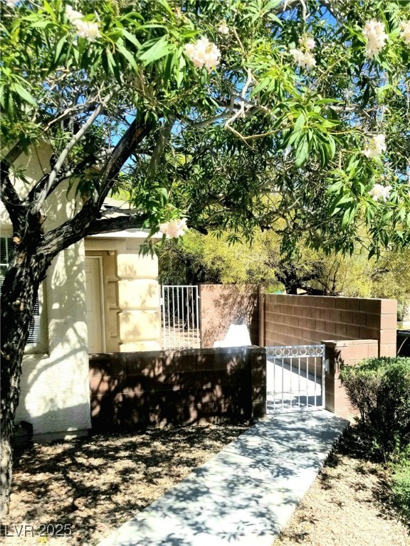 View of home's exterior with a gate