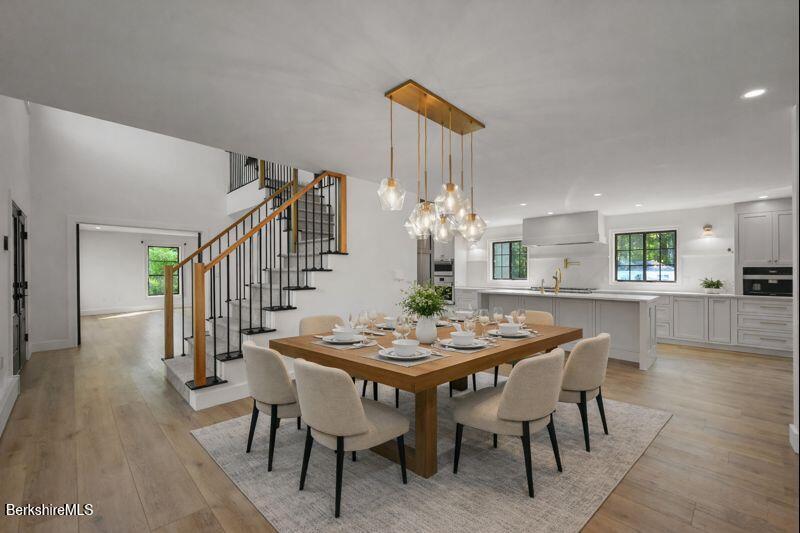 65 Johnson Road Dalton, MA 01226 - Photo 11 of 76 a view of a dining room with furniture and wooden floor