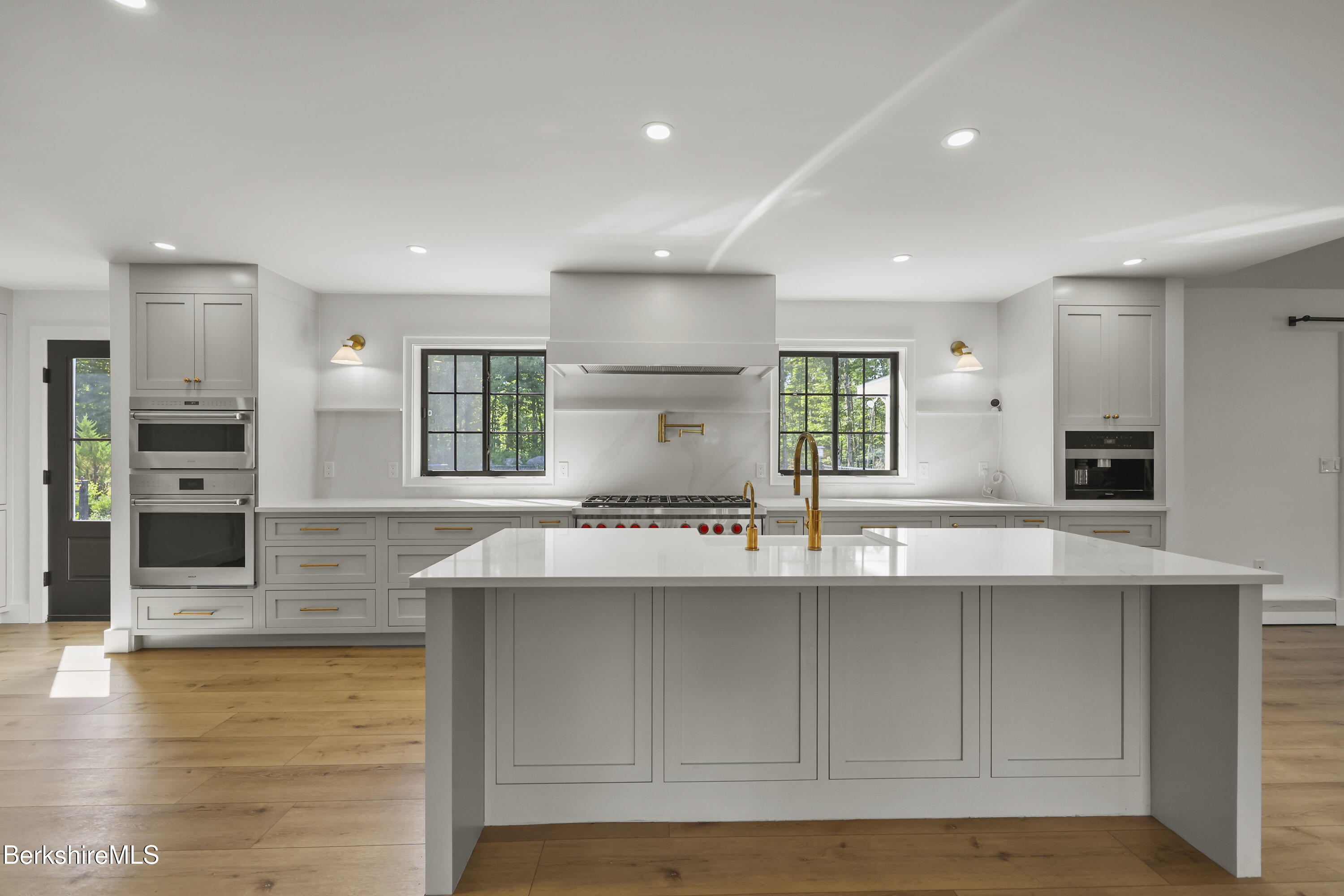 65 Johnson Road Dalton, MA 01226 - Photo 13 of 76 a kitchen with stainless steel appliances granite countertop a sink and a stove