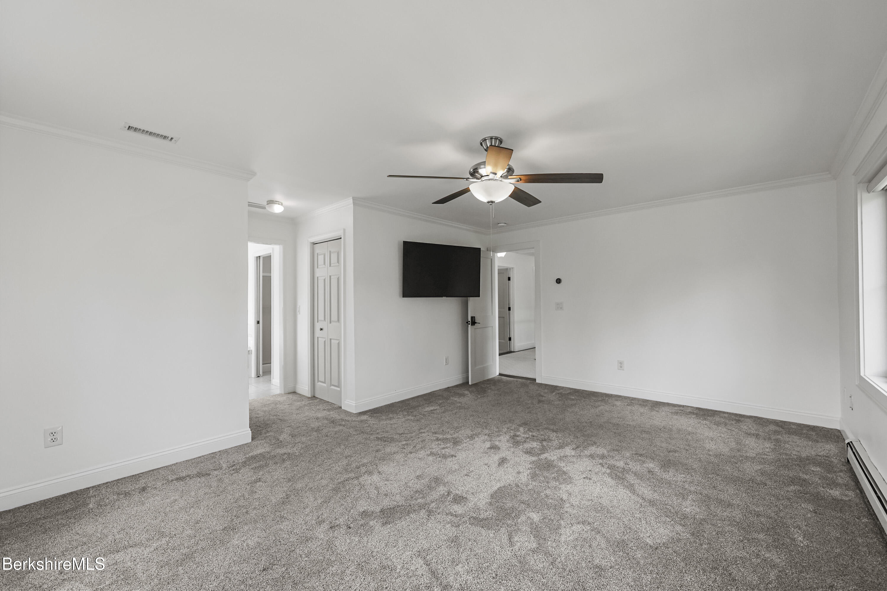 65 Johnson Road Dalton, MA 01226 - Photo 33 of 76 a view of a livingroom with a flat screen tv