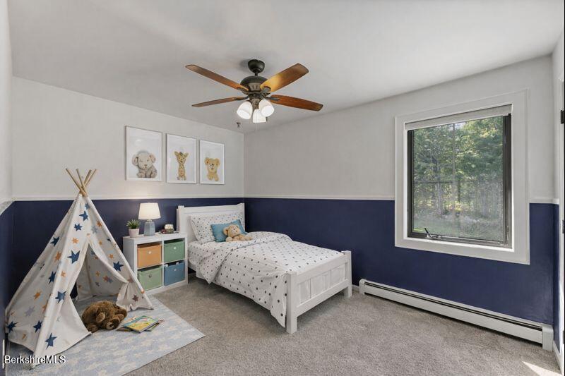 65 Johnson Road Dalton, MA 01226 - Photo 40 of 76 a bedroom with furniture and a window