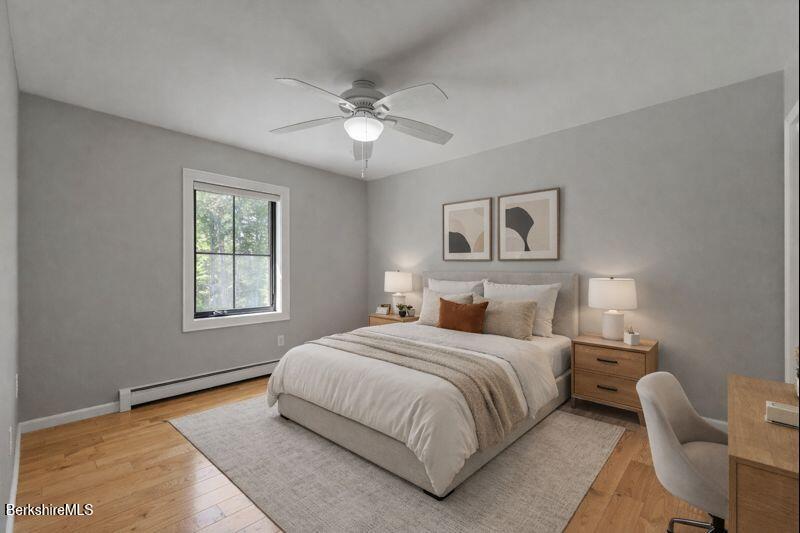 65 Johnson Road Dalton, MA 01226 - Photo 46 of 76 a bedroom with a large bed and a window