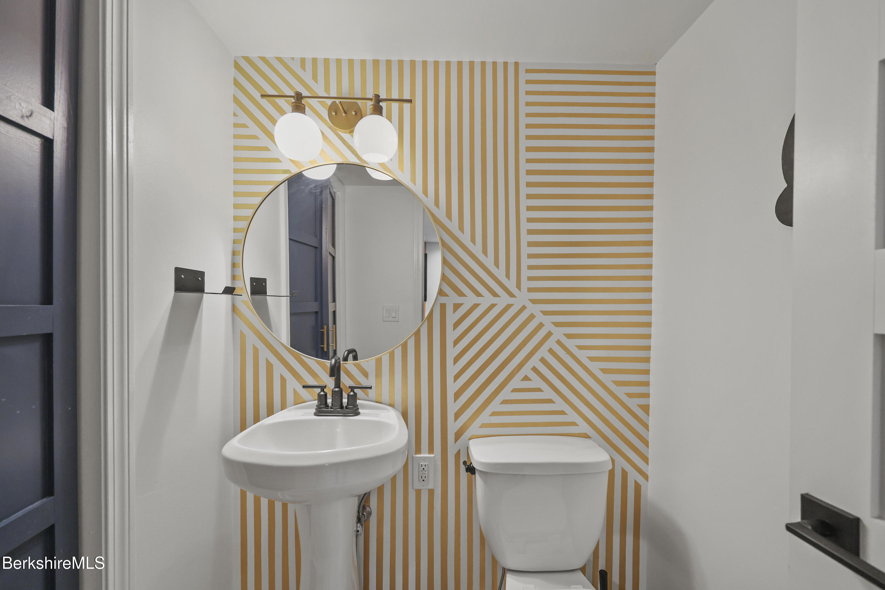 65 Johnson Road Dalton, MA 01226 - Photo 56 of 76 a bathroom with a sink and a mirror