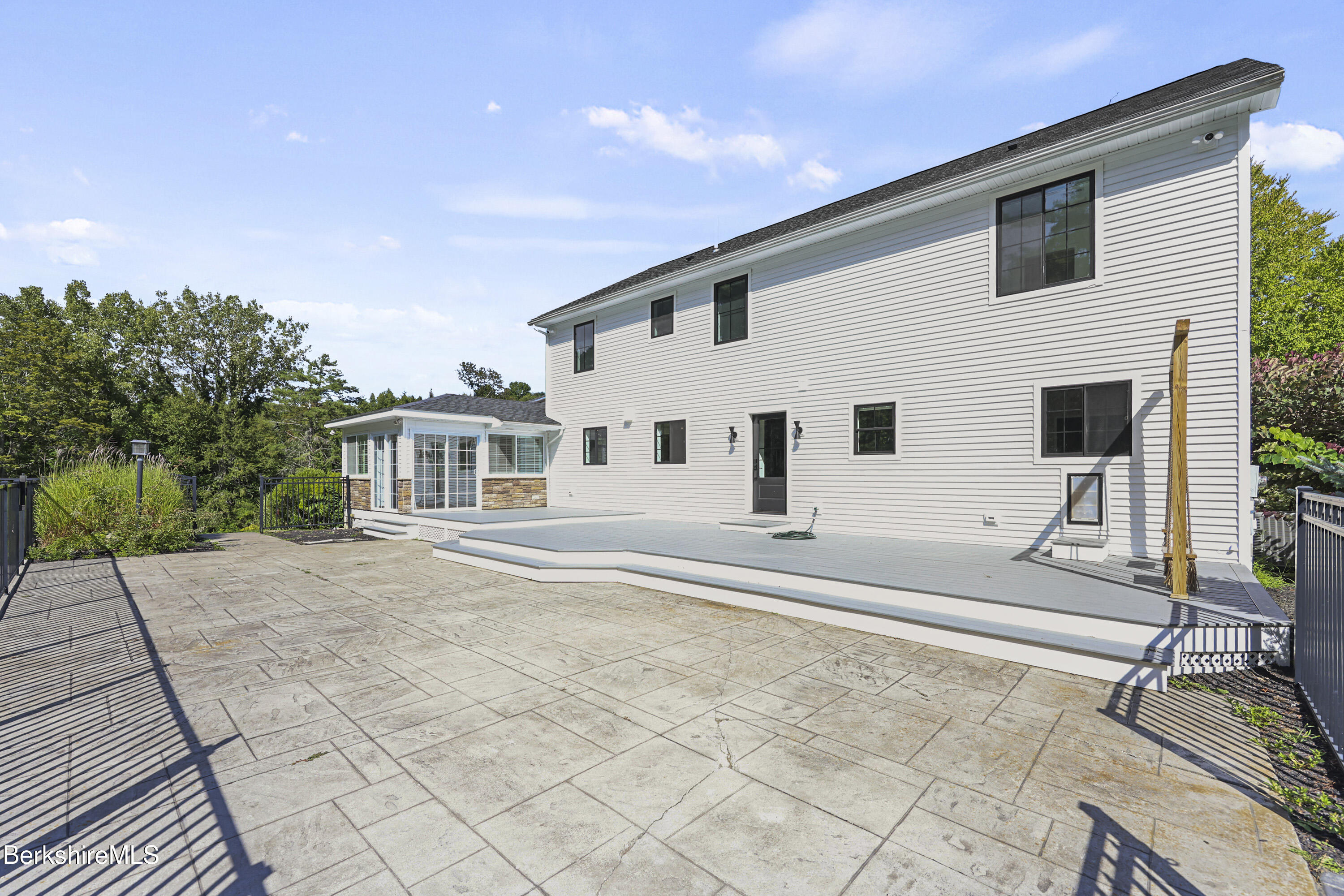 65 Johnson Road Dalton, MA 01226 - Photo 58 of 76 a front view of a house with a patio