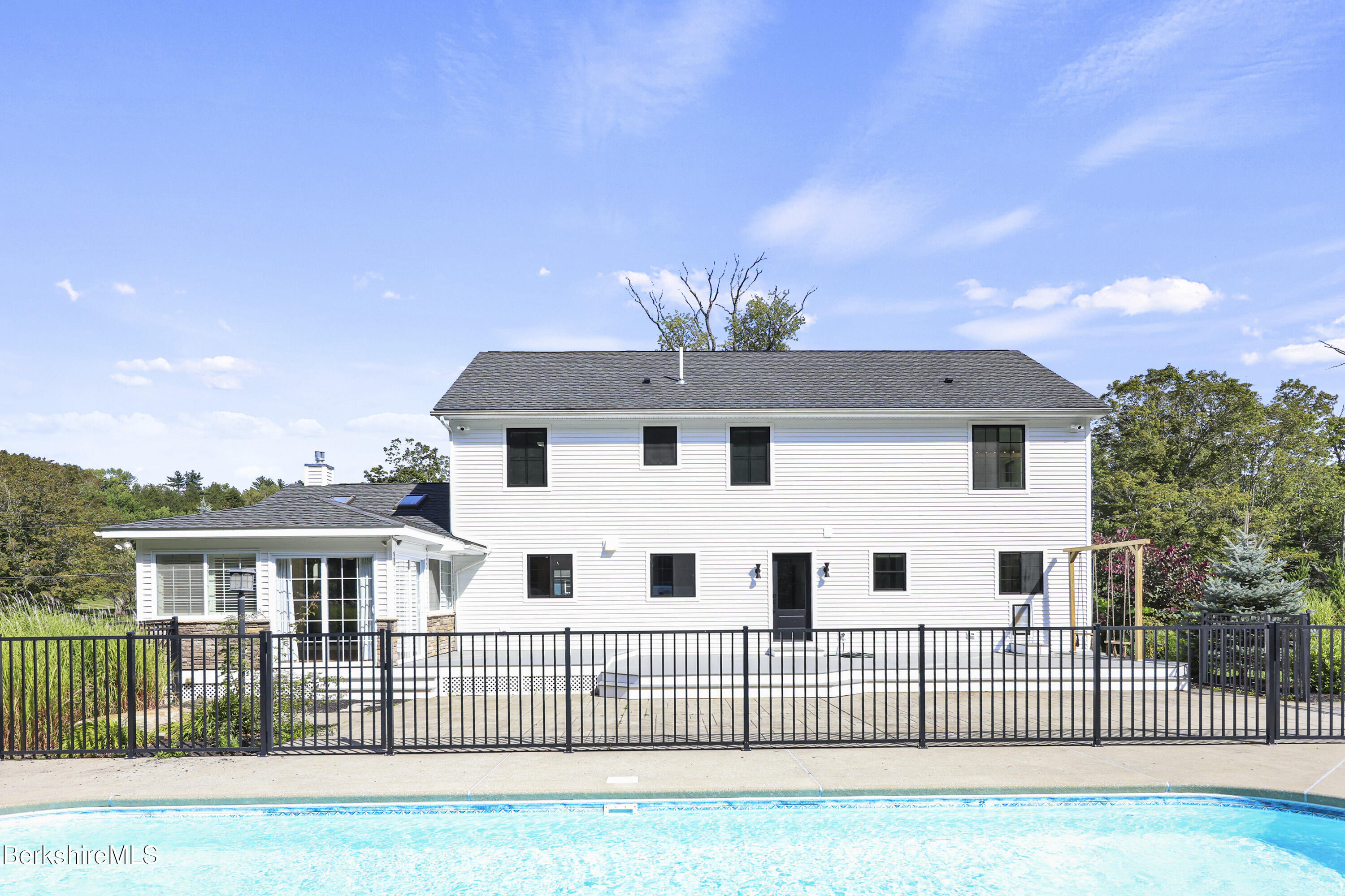 65 Johnson Road Dalton, MA 01226 - Photo 61 of 76 a view of a white house with a yard