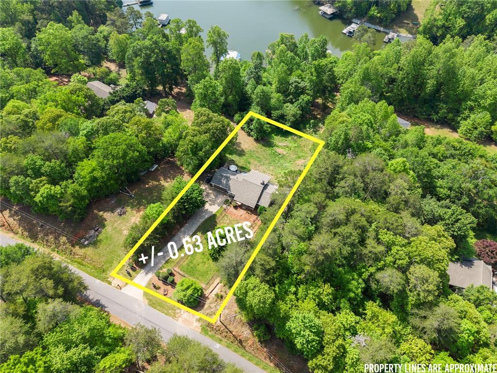 3456 Botany Woods Road Gainesville, GA 30506 - Photo 1 of 1 an aerial view of a residential houses with outdoor space and street view
