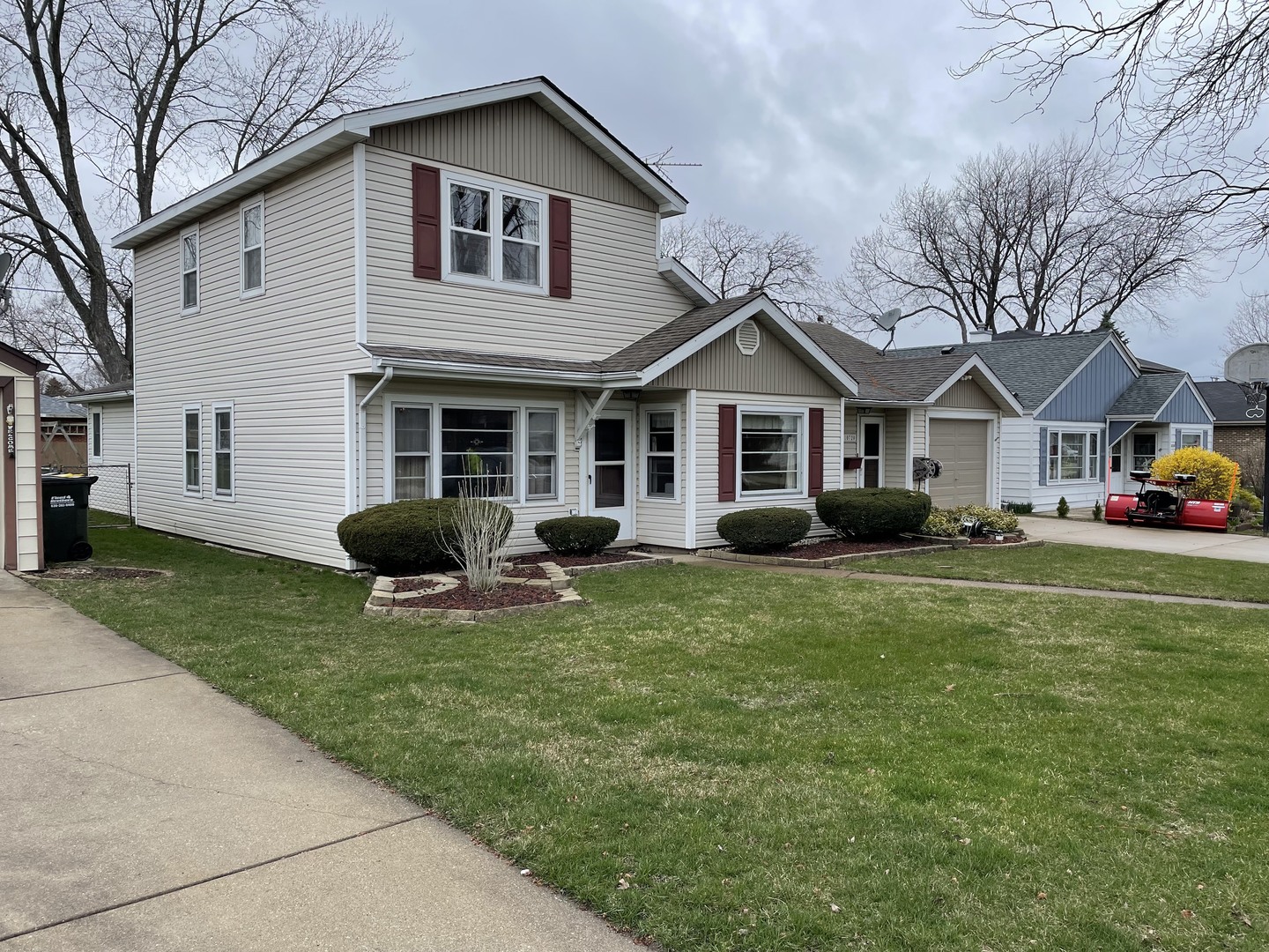 10720 Princess Avenue Chicago Ridge, IL 60415 - Photo 2 of 34 a front view of house with yard and green space