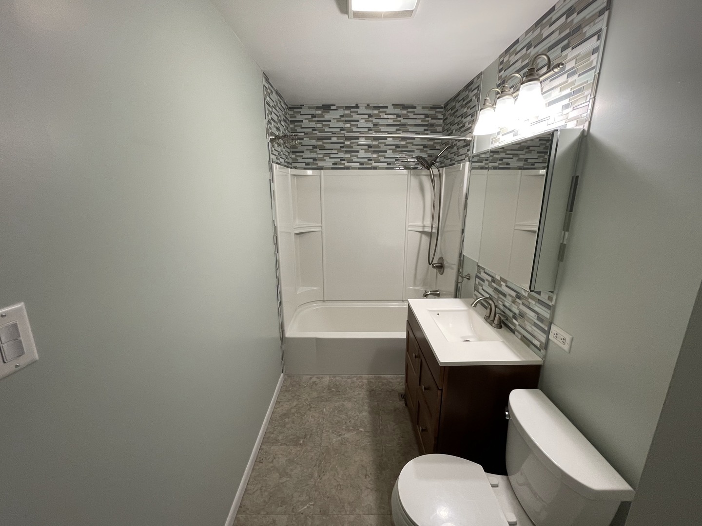 10720 Princess Avenue Chicago Ridge, IL 60415 - Photo 23 of 34 a bathroom with a sink toilet and shower