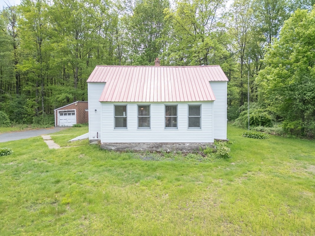 92 Squannacook Road Shirley, MA 01464 - Photo 24 of 38 a house view with a garden space