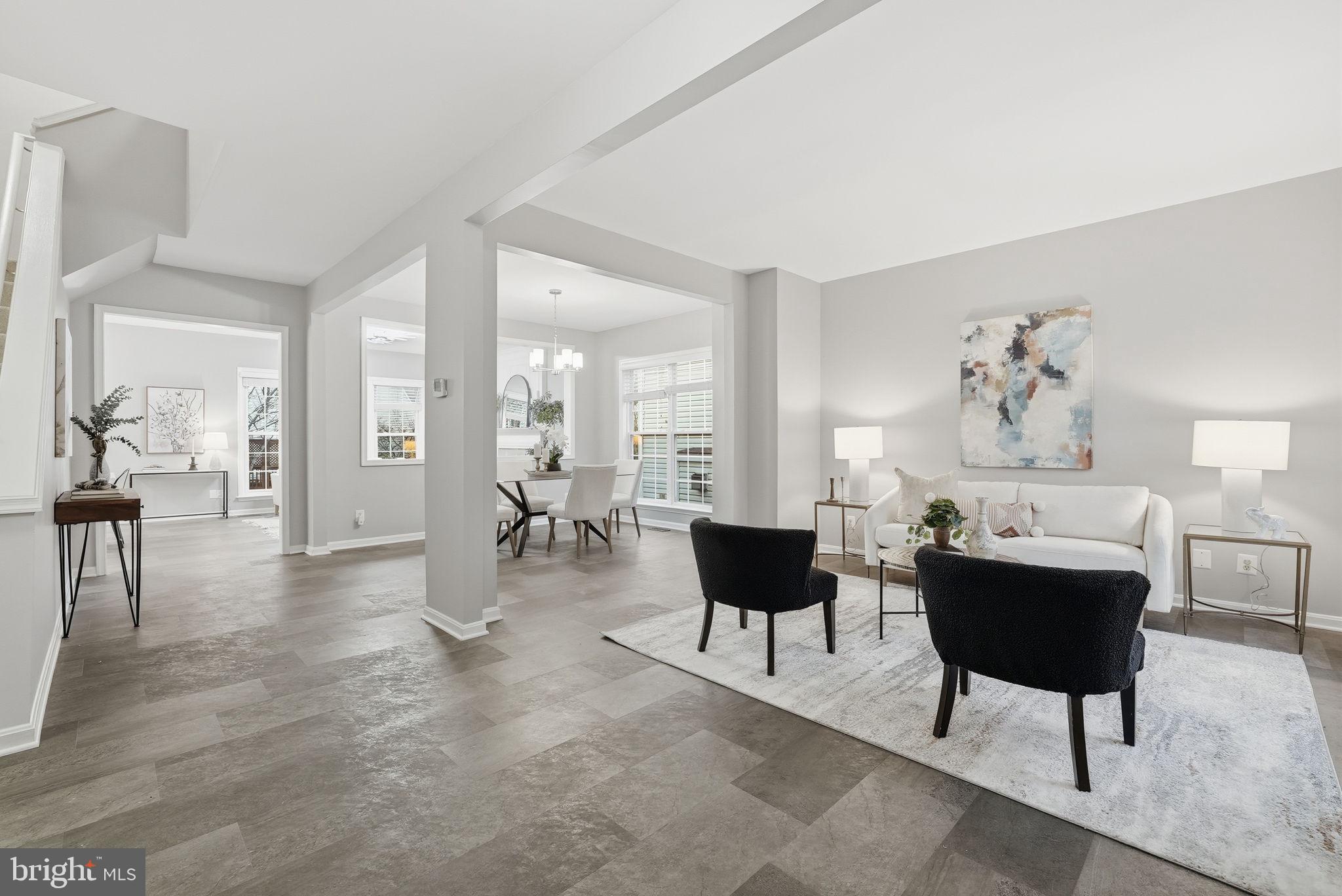 12402 Brown Fox Way Reston, VA 20191 - Photo 11 of 52 a living room with furniture and view of kitchen