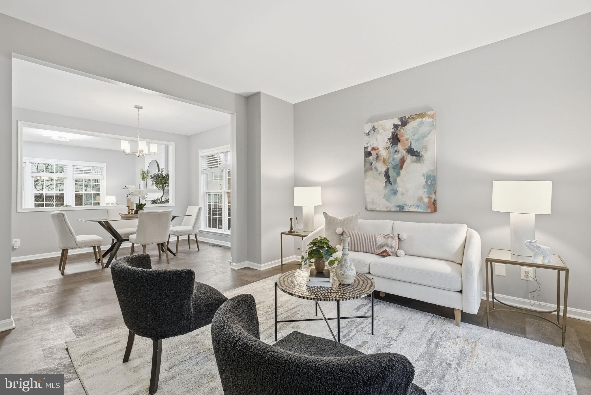 12402 Brown Fox Way Reston, VA 20191 - Photo 12 of 52 a living room with furniture and a potted plant