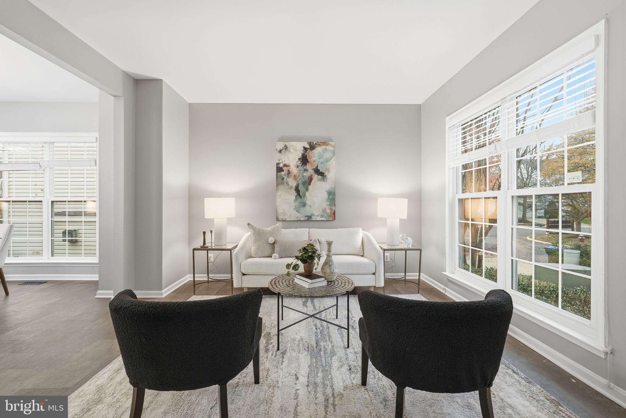 12402 Brown Fox Way Reston, VA 20191 - Photo 13 of 52 a living room with furniture and a large window
