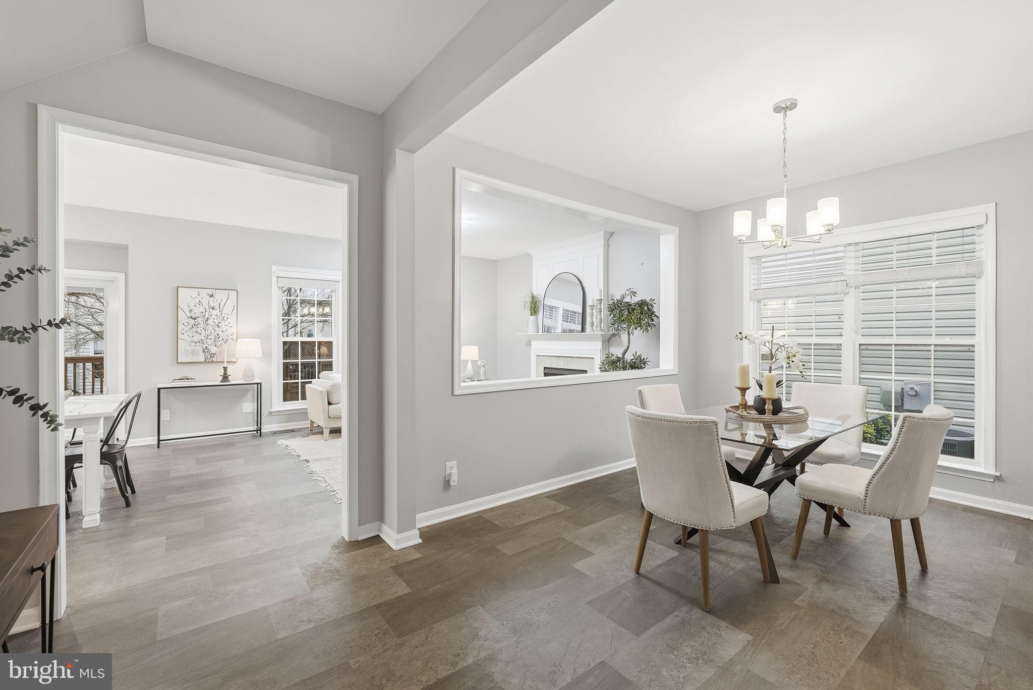 12402 Brown Fox Way Reston, VA 20191 - Photo 16 of 52 a dining room with furniture and window