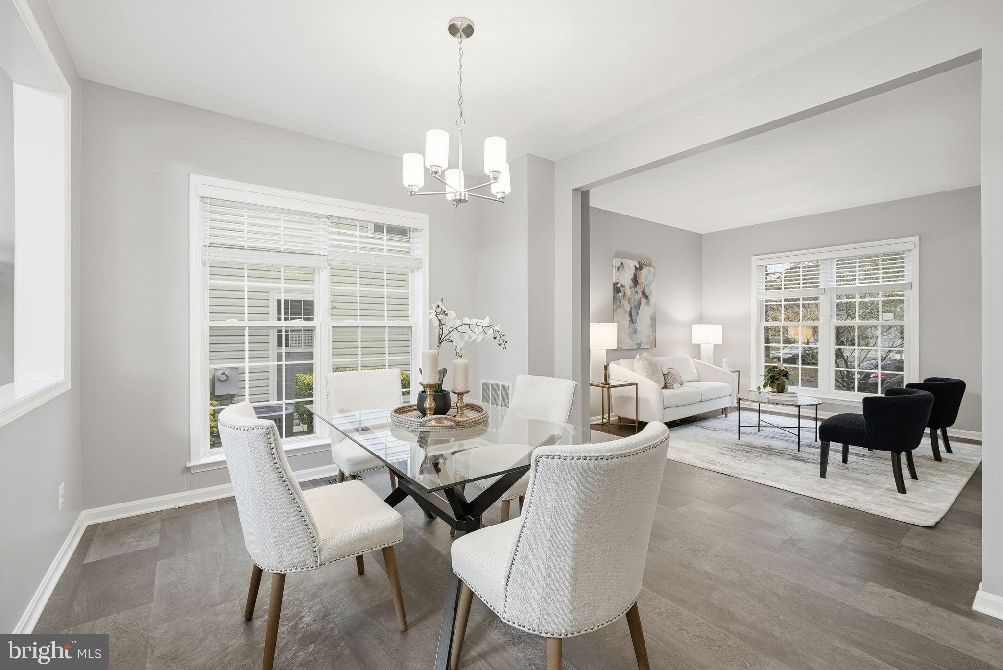 12402 Brown Fox Way Reston, VA 20191 - Photo 18 of 52 a view of a dining room with furniture window and outside view