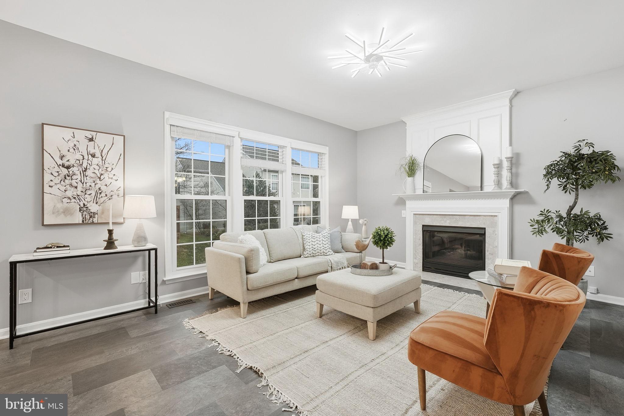 12402 Brown Fox Way Reston, VA 20191 - Photo 21 of 52 a living room with furniture and a fireplace