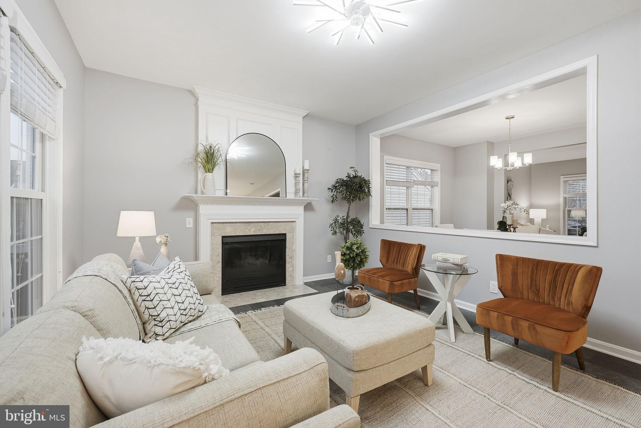 12402 Brown Fox Way Reston, VA 20191 - Photo 23 of 52 a living room with furniture and a fireplace