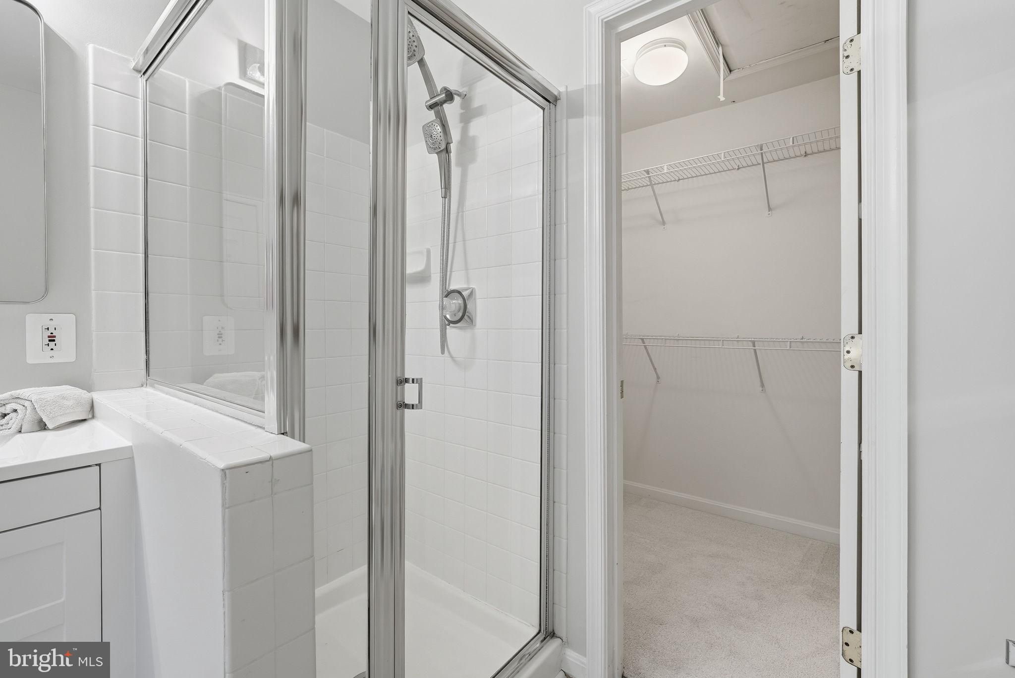 12402 Brown Fox Way Reston, VA 20191 - Photo 31 of 52 a bathroom with a shower and a sink