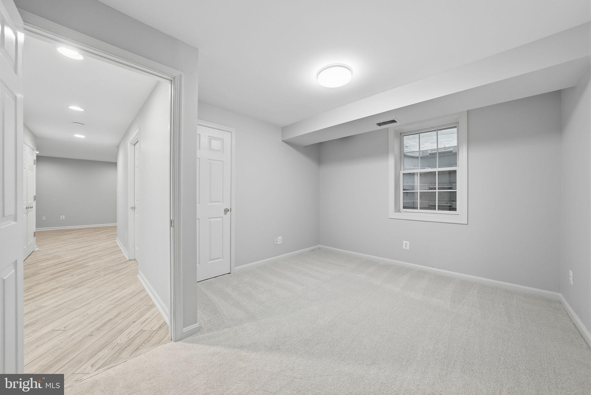 12402 Brown Fox Way Reston, VA 20191 - Photo 41 of 52 a view of an empty room with a window
