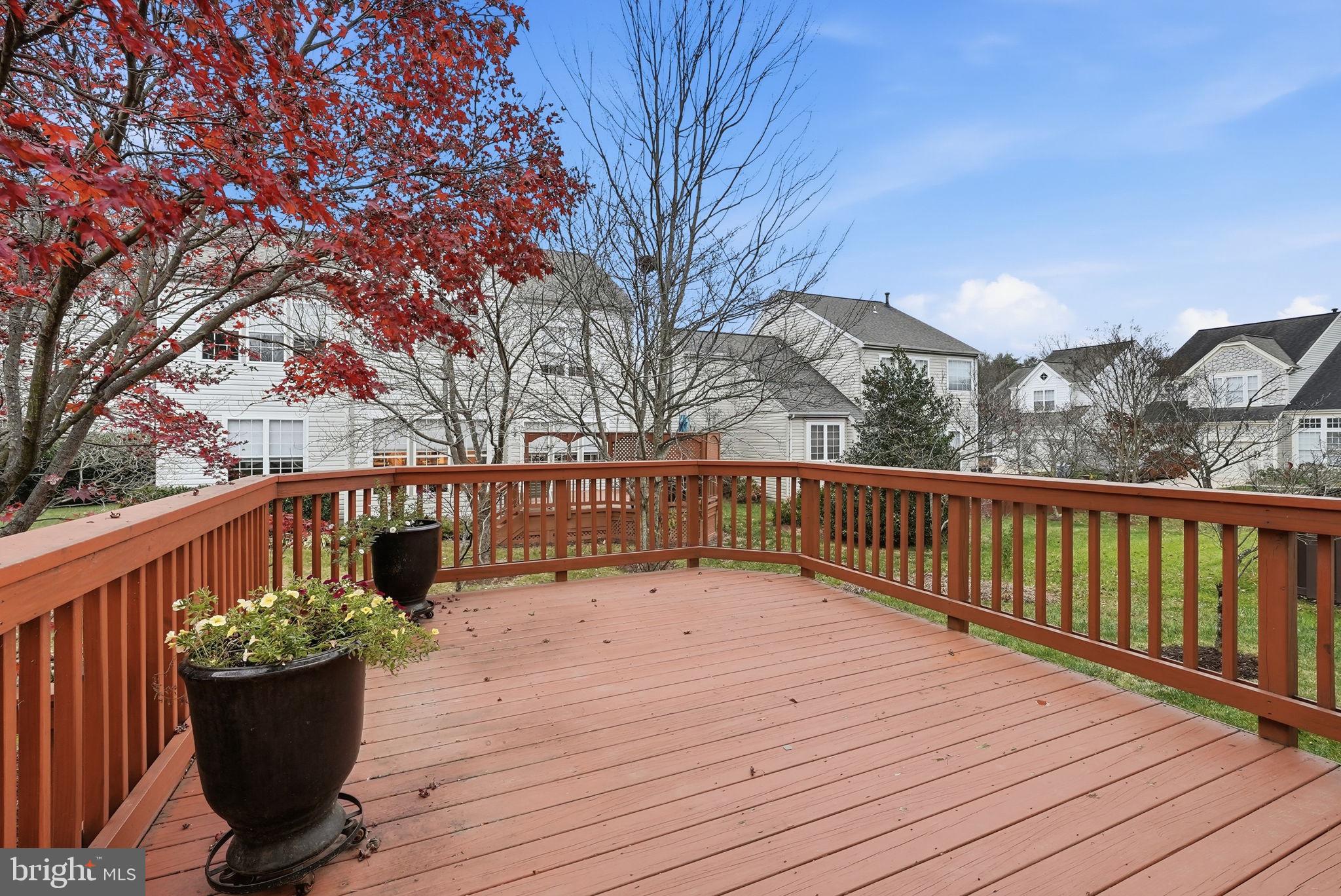 12402 Brown Fox Way Reston, VA 20191 - Photo 45 of 52 a balcony with wooden floor and trees