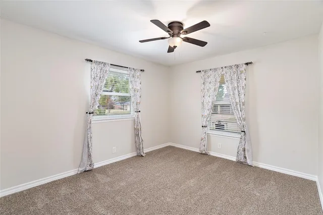 a view of workspace with cabinet and window