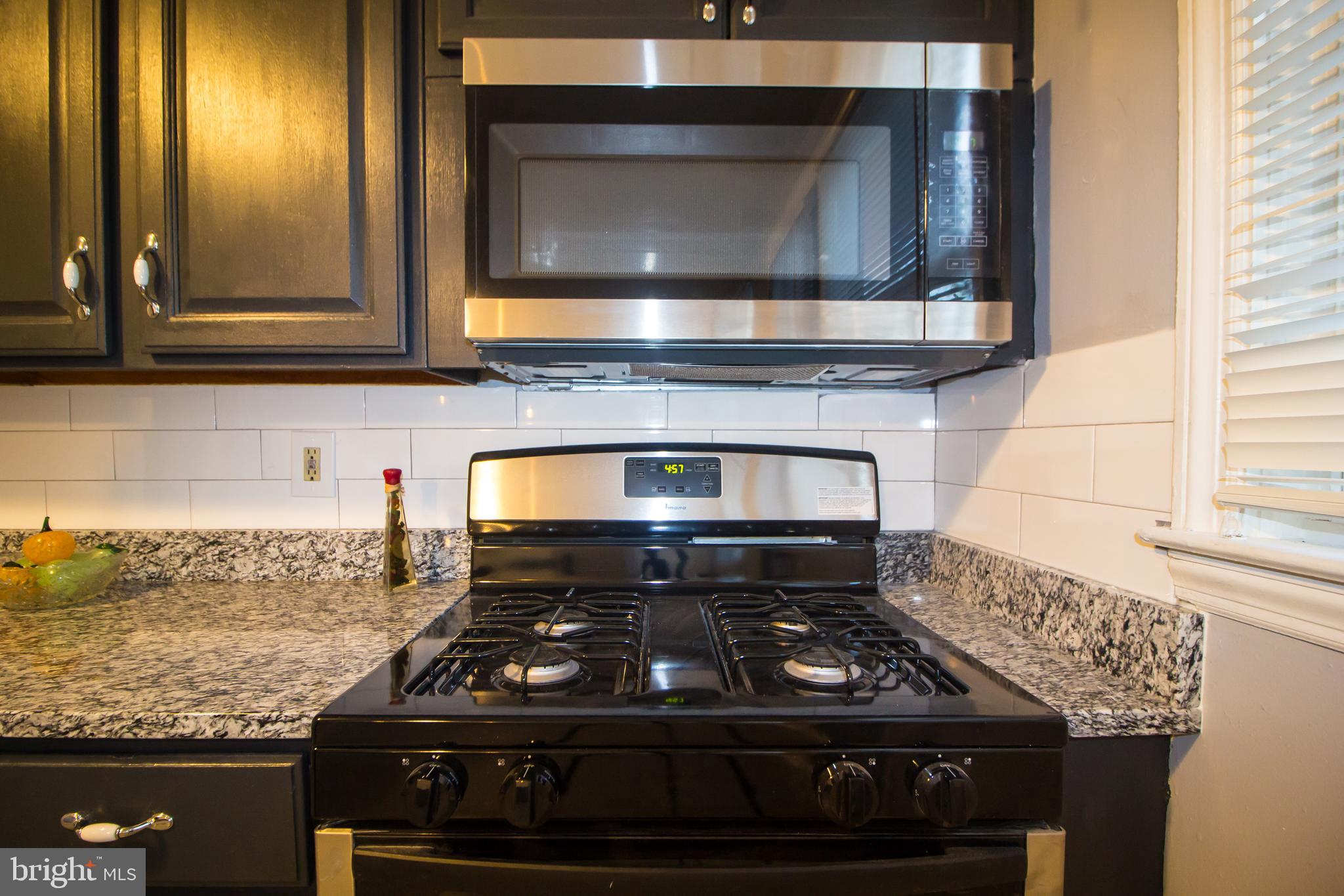 1634 Heathfield Road Baltimore, MD 21239 - Photo 22 of 30 Kitchen New Microwave and Burn Top Oven View #4