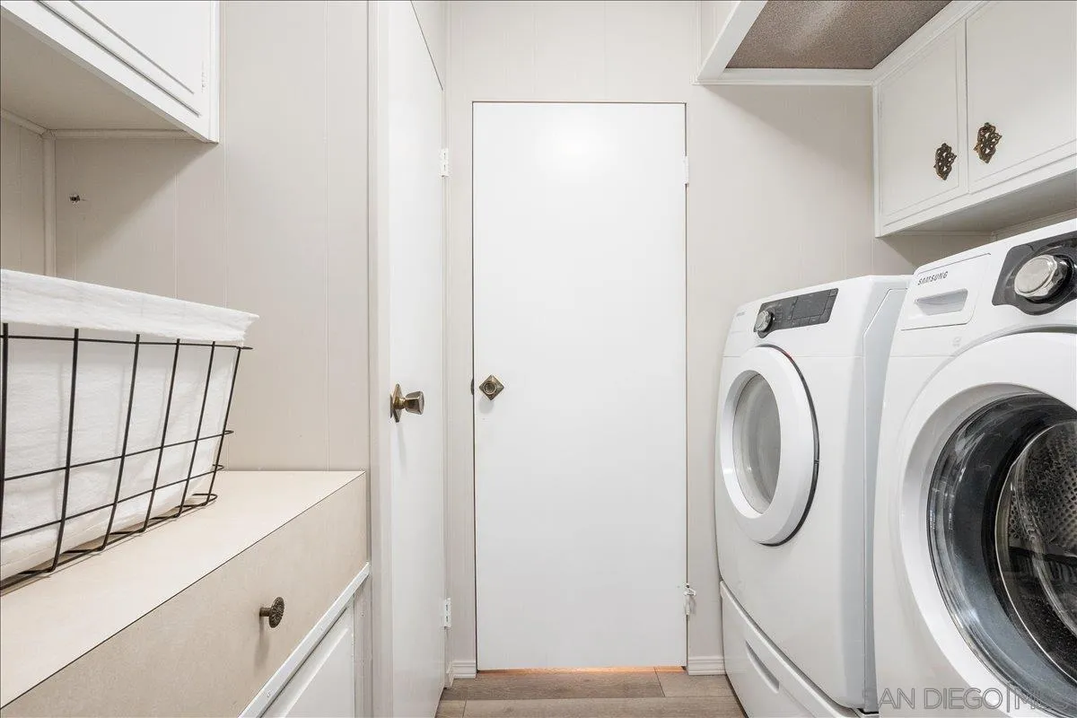90 Blue Sky Lane Oceanside, CA 92056 - Photo 26 of 26 a utility room with dryer and washer