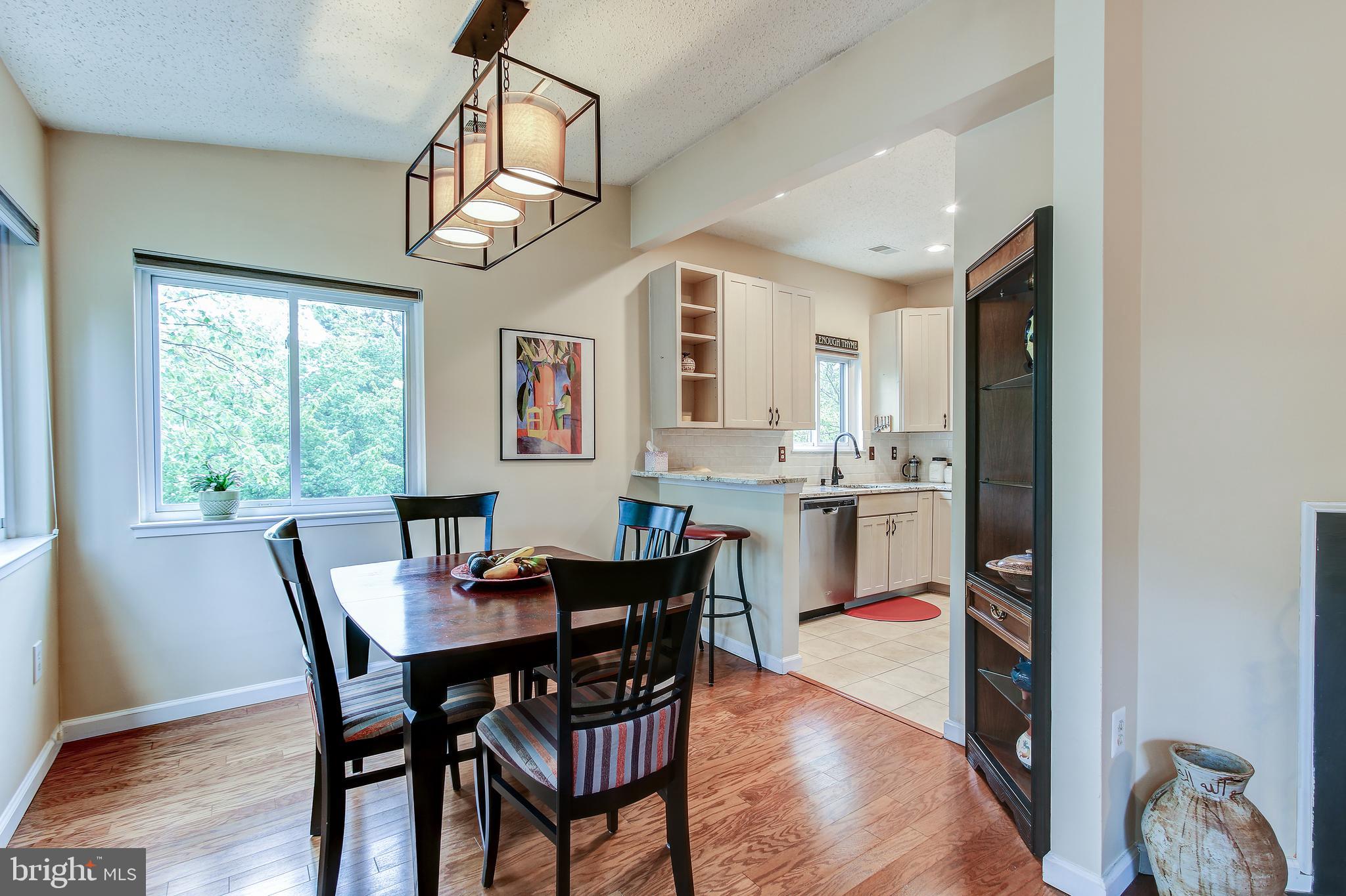 11049 Villaridge Court Reston, VA 20191 - Photo 8 of 29 Dining Area connected to Kitchen