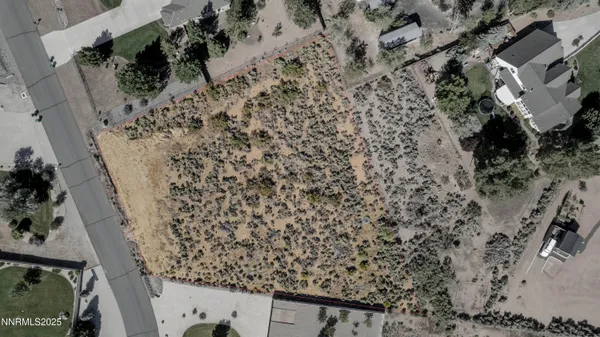 an aerial view of mountain and ocean