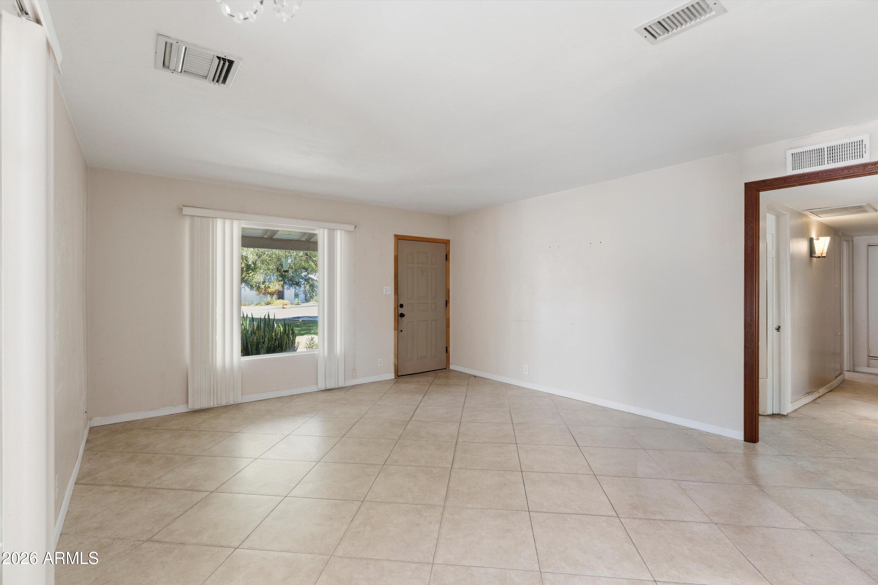 1130 East Colter Street Phoenix, AZ 85014 - Photo 8 of 37 13-Living Room - shelves removed