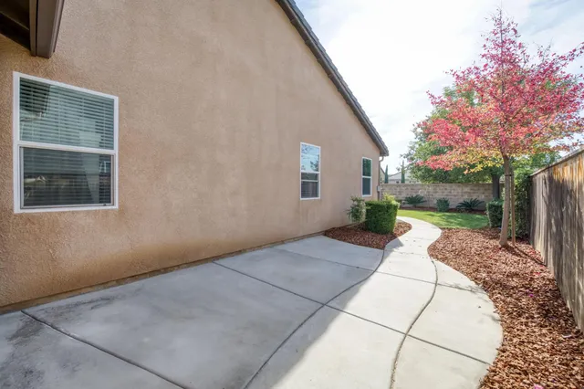 a view of a porch with seating space