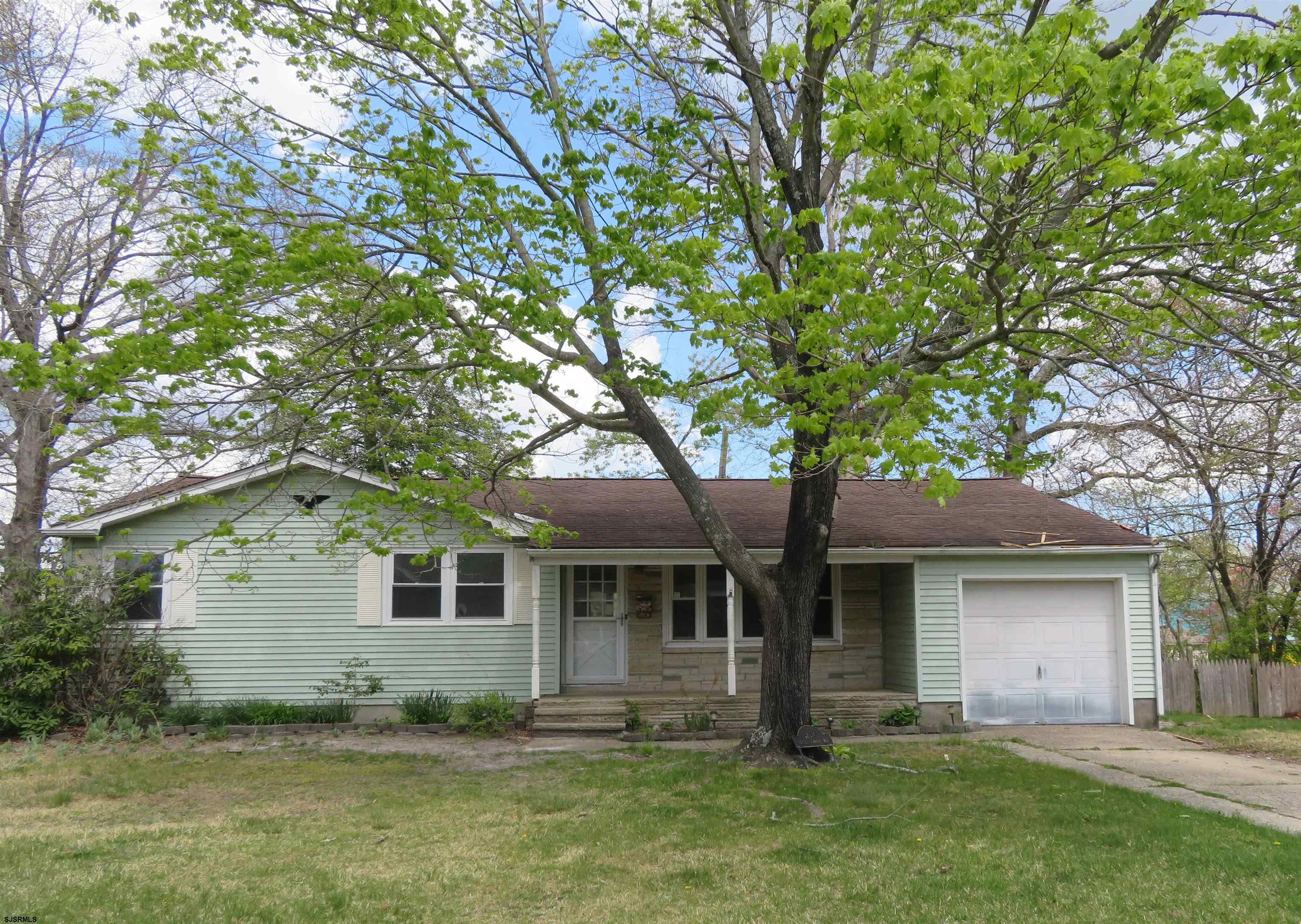 1830 Birch Grove Road Northfield, NJ 08225 - Photo 1 of 11 a front view of a house with a yard