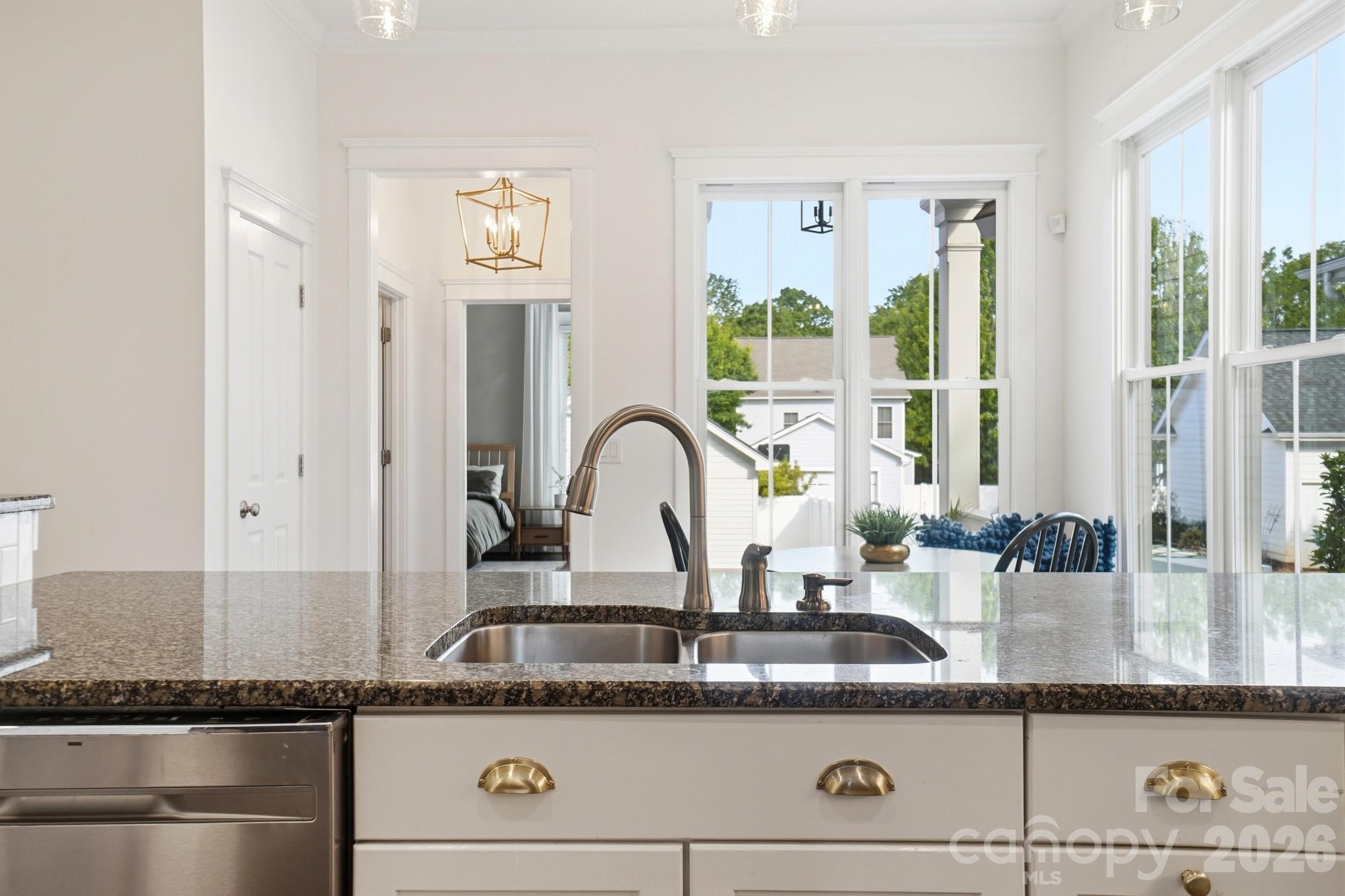 4333 Birkshire Heights Fort Mill, SC 29708 - Photo 14 of 48 a kitchen with granite countertop a sink and a granite counter tops