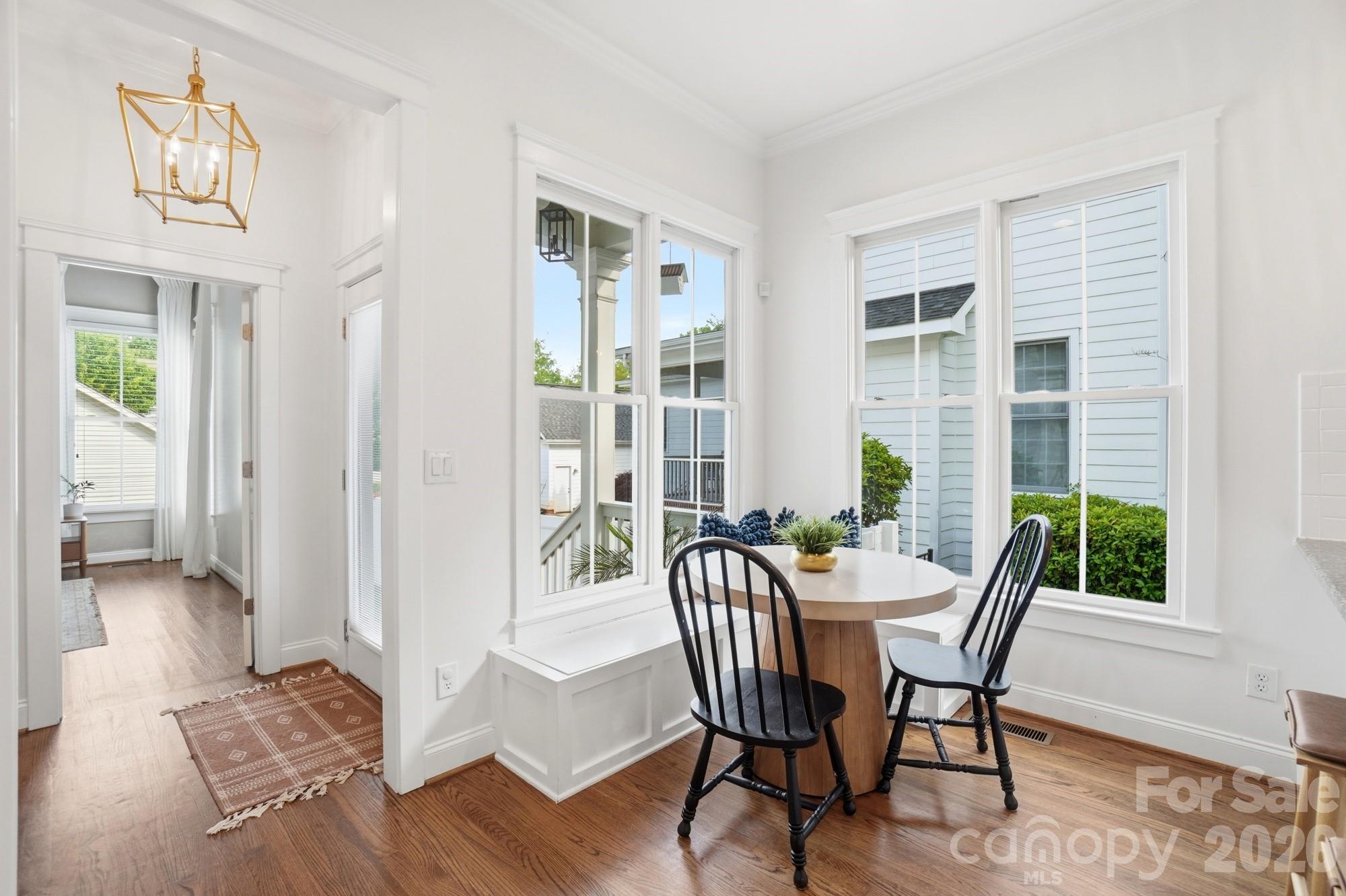 4333 Birkshire Heights Fort Mill, SC 29708 - Photo 17 of 48 a view of a dining room with furniture and wooden floor