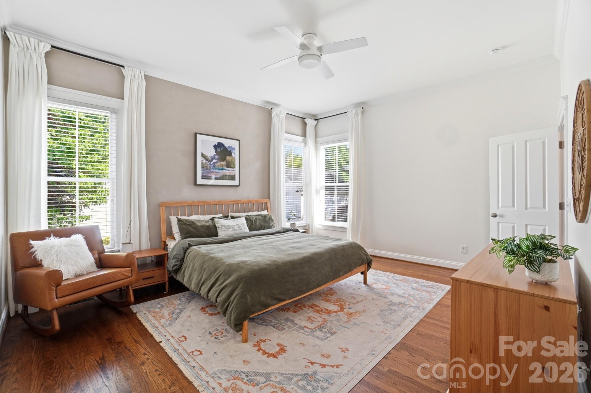 4333 Birkshire Heights Fort Mill, SC 29708 - Photo 21 of 48 a bedroom with a large bed couch and a window