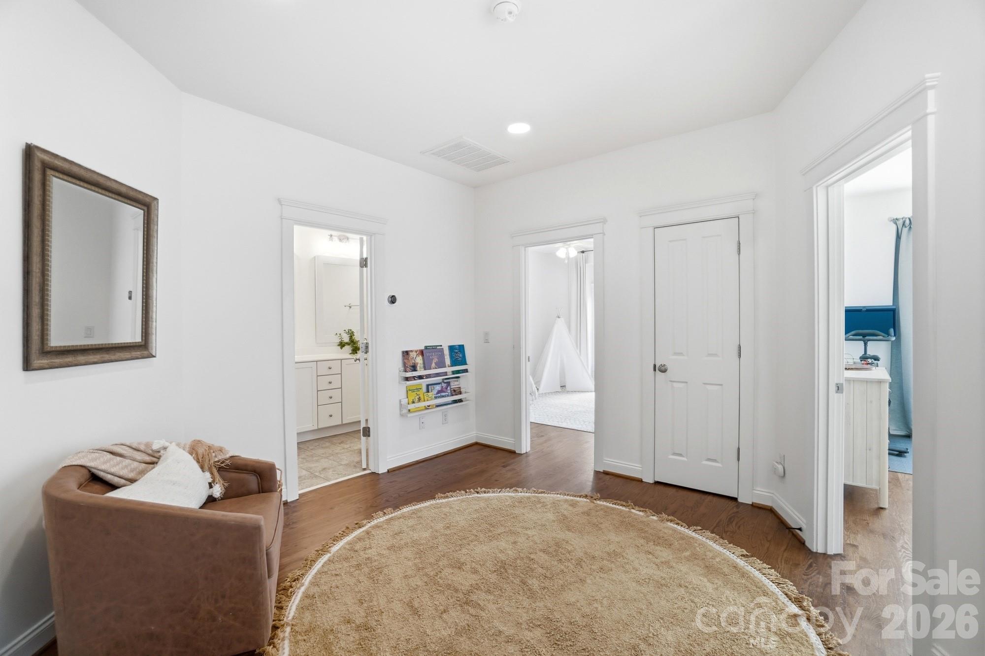 4333 Birkshire Heights Fort Mill, SC 29708 - Photo 27 of 48 a spacious bedroom with a bed and a couch