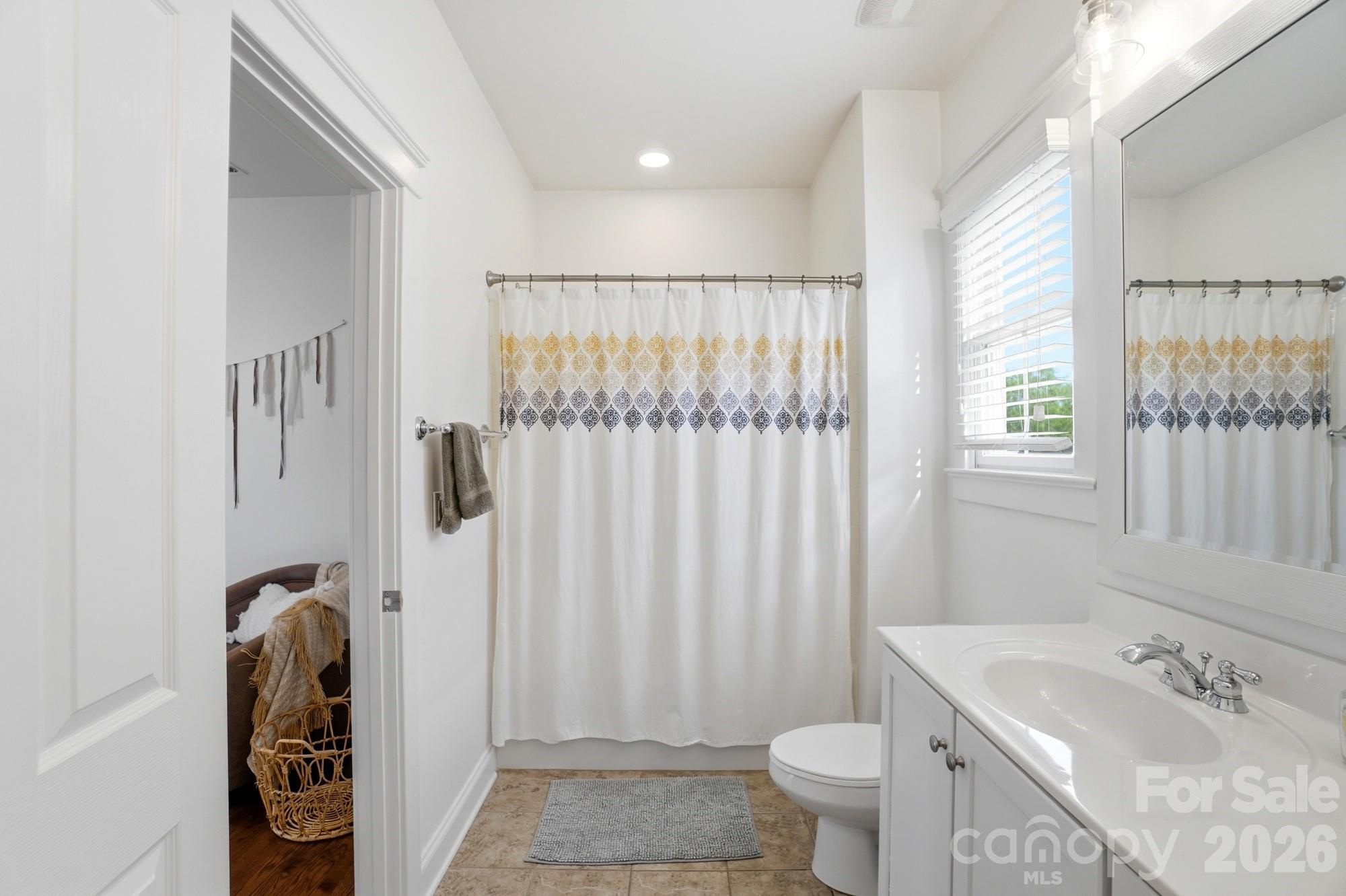 4333 Birkshire Heights Fort Mill, SC 29708 - Photo 39 of 48 a bathroom with a sink toilet and shower