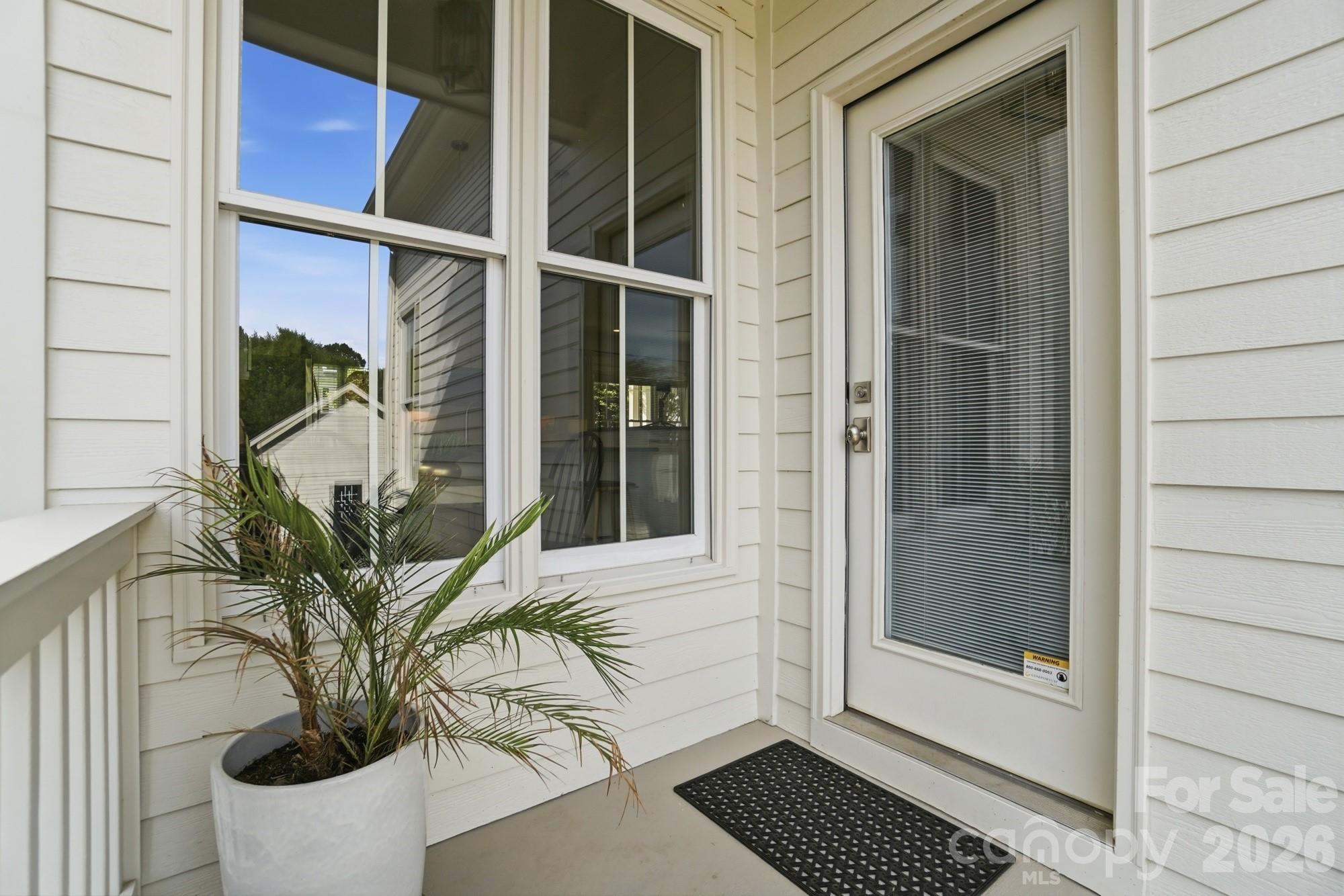 4333 Birkshire Heights Fort Mill, SC 29708 - Photo 41 of 48 a view of a house with a window and wooden floor