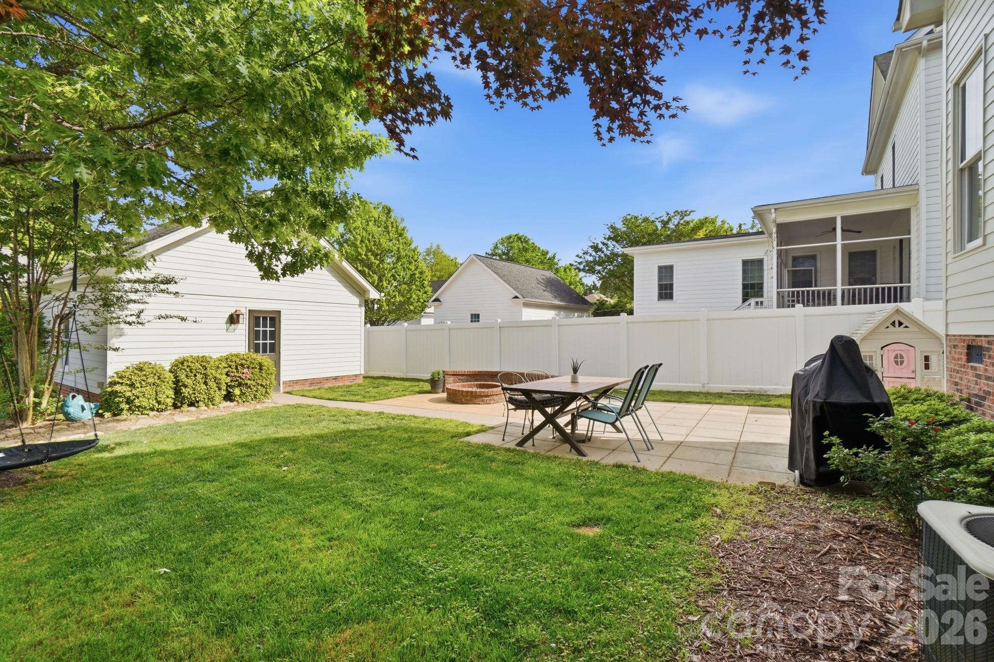 4333 Birkshire Heights Fort Mill, SC 29708 - Photo 46 of 48 a view of a house with backyard and a tree