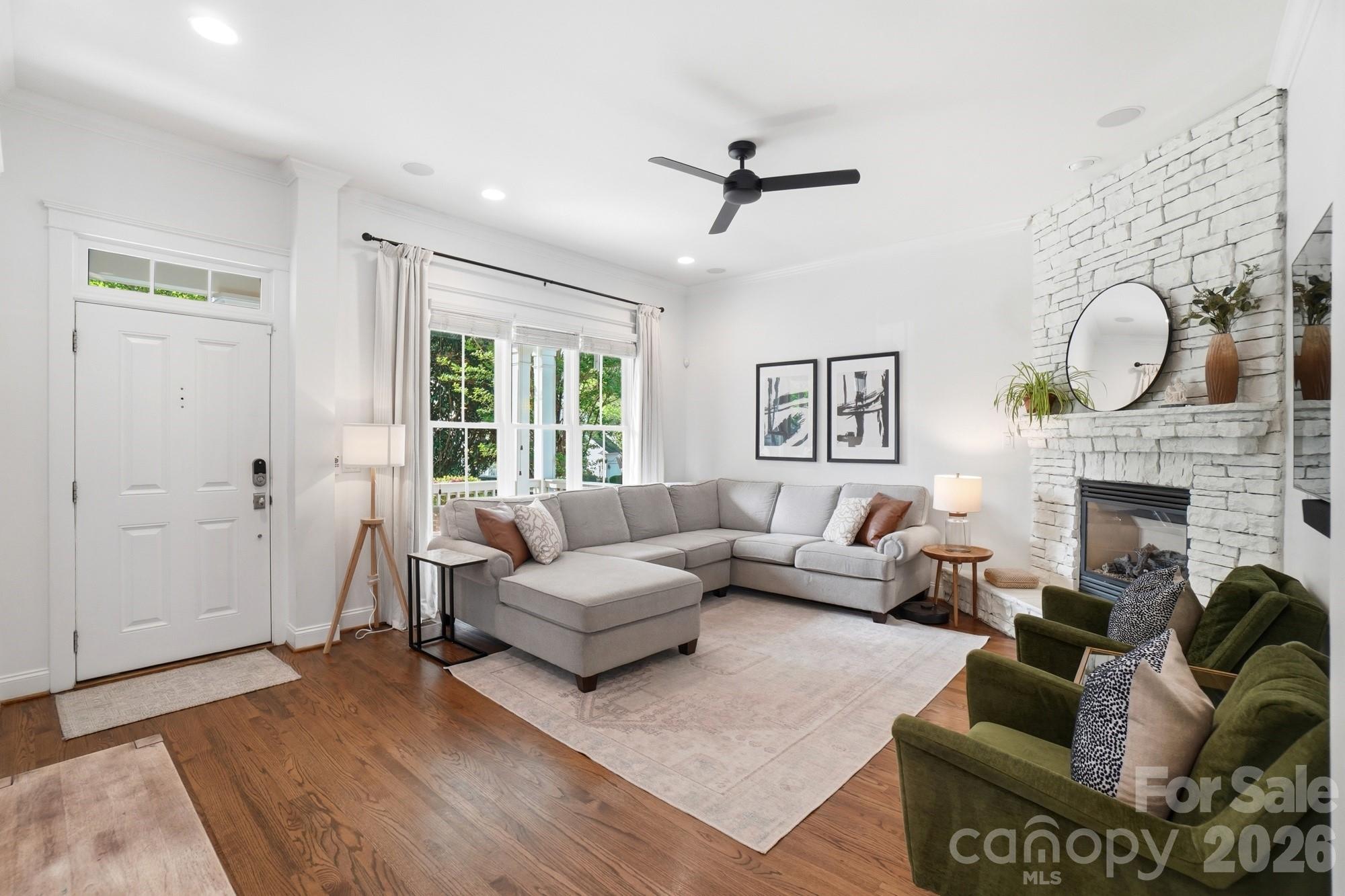 4333 Birkshire Heights Fort Mill, SC 29708 - Photo 6 of 48 a living room with furniture and a fireplace