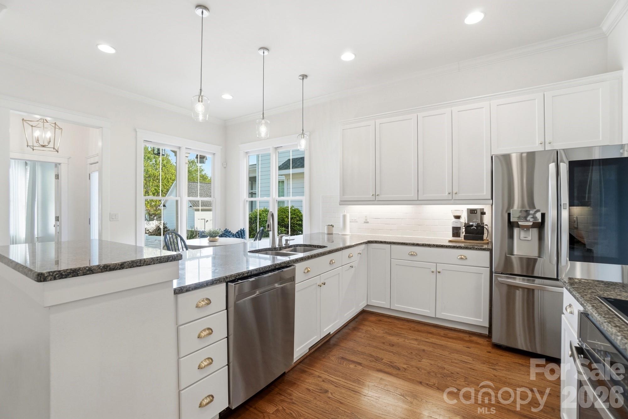 4333 Birkshire Heights Fort Mill, SC 29708 - Photo 10 of 48 a kitchen with a sink stainless steel appliances and windows