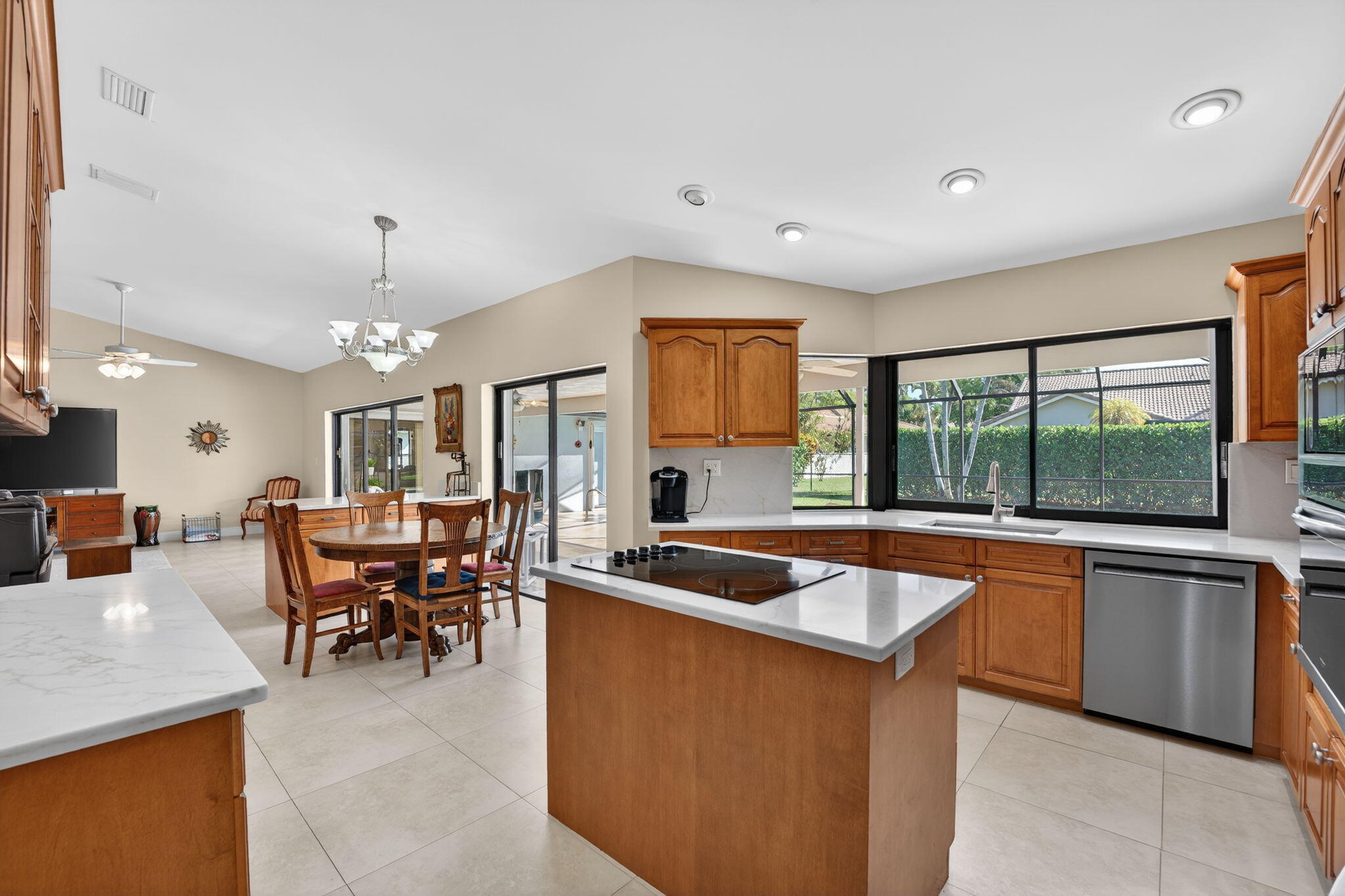 5111 Northwest 85th Road Coral Springs, FL 33067 - Photo 18 of 47 a kitchen with stainless steel appliances granite countertop counter space a sink and cabinets