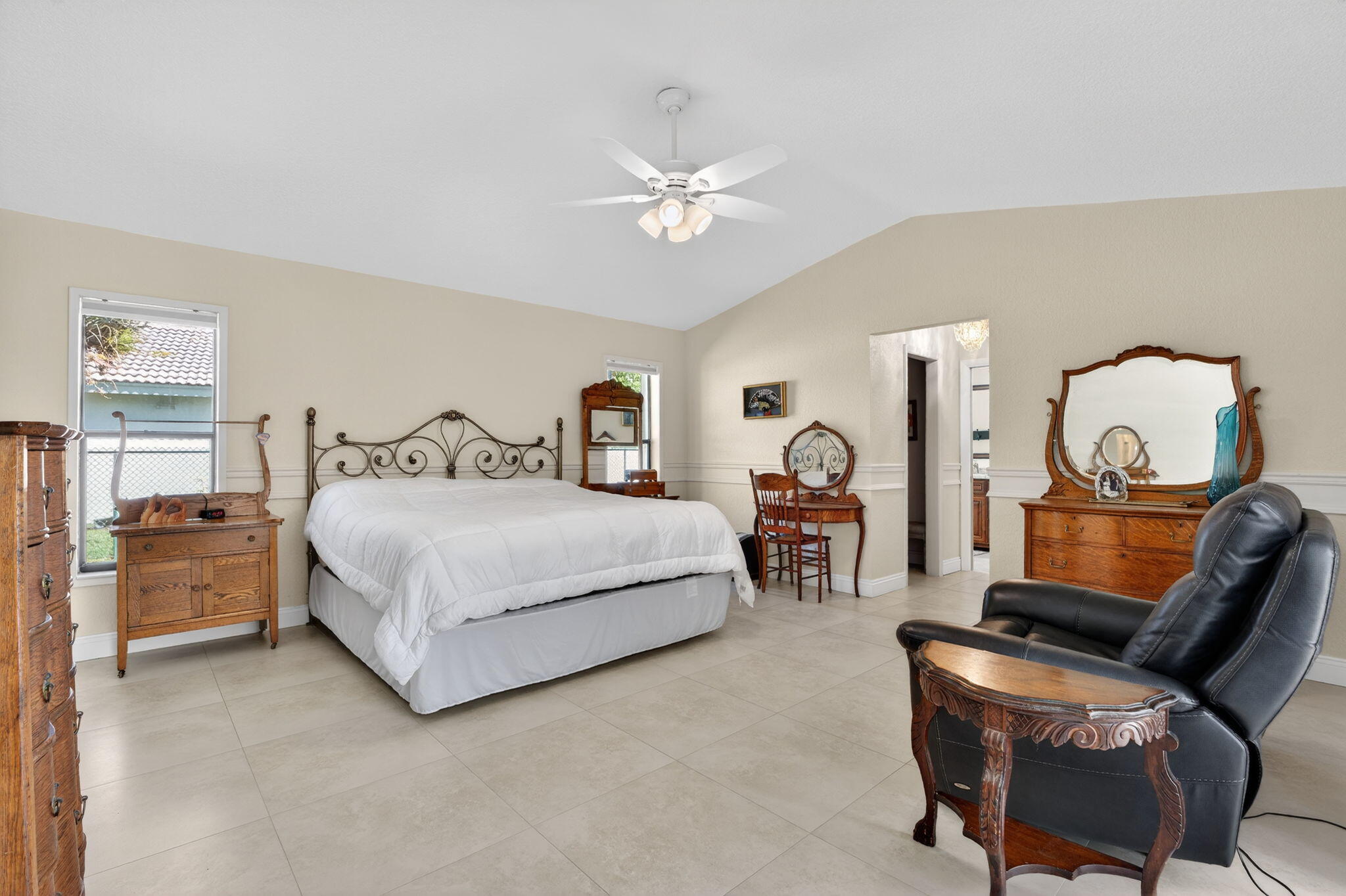 5111 Northwest 85th Road Coral Springs, FL 33067 - Photo 21 of 47 a bedroom with bed and window