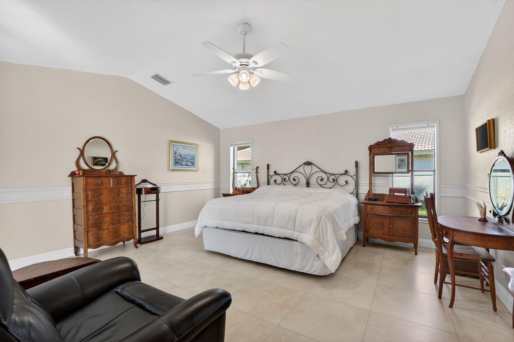 5111 Northwest 85th Road Coral Springs, FL 33067 - Photo 23 of 47 a bedroom with bed and window