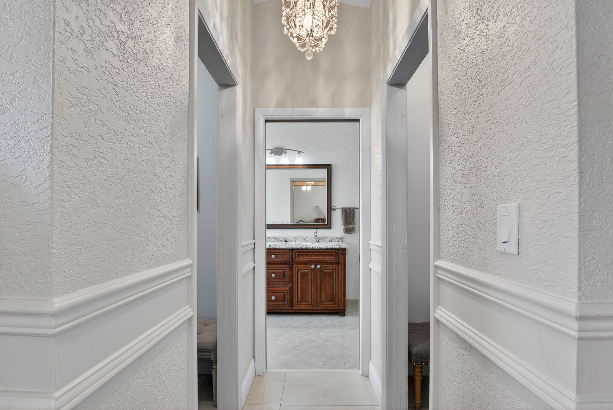 5111 Northwest 85th Road Coral Springs, FL 33067 - Photo 24 of 47 a en suite bathroom with a sink and a mirror